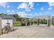 Cozy outdoor patio with a brick surface, covered pergola, and outdoor seating at 400 Palo Verde Dr., Myrtle Beach, SC 29579