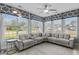 Bright sunroom featuring a large sectional sofa and abundant natural light at 400 Palo Verde Dr., Myrtle Beach, SC 29579