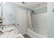 Bathroom featuring a granite sink vanity, tub and shower combo, and wood-look flooring at 448 Papyrus Circle # 448, Little River, SC 29566
