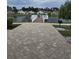 Community dock over a serene lake, providing residents with fishing access and scenic views at 448 Papyrus Circle # 448, Little River, SC 29566