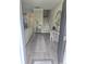 Inviting foyer with gray floors, decorative accents, and staircase leading to the upper level at 448 Papyrus Circle # 448, Little River, SC 29566