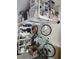 Organized garage featuring overhead storage racks and shelving units, maximizing space and efficiency at 448 Papyrus Circle # 448, Little River, SC 29566
