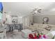 Bright living room with open layout, comfortable seating, and seamless flow to the kitchen at 448 Papyrus Circle # 448, Little River, SC 29566