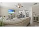 Open concept living space with view of kitchen with white cabinets and breakfast bar seating at 448 Papyrus Circle # 448, Little River, SC 29566