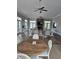 Spacious clubhouse lounge with comfortable seating, fireplace, and large windows offering natural light at 448 Papyrus Circle # 448, Little River, SC 29566