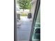 This back patio has a BBQ and a white picket fence at 448 Papyrus Circle # 448, Little River, SC 29566
