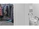 Bathroom includes an accessible toilet and closet with organized storage at 452 Sun Colony Blvd., Longs, SC 29568