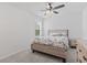 Cozy bedroom with a comfortable bed, side table, and ceiling fan at 452 Sun Colony Blvd., Longs, SC 29568