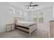 Cozy bedroom with neutral tones, natural light, and ceiling fan at 452 Sun Colony Blvd., Longs, SC 29568