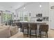 Bright kitchen with white cabinets, granite countertops, and stainless steel appliances at 452 Sun Colony Blvd., Longs, SC 29568
