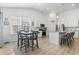 Spacious kitchen with modern appliances, center island, and adjacent dining area at 452 Sun Colony Blvd., Longs, SC 29568