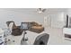 Inviting living room with comfortable seating and an exercise bike at 452 Sun Colony Blvd., Longs, SC 29568