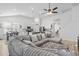 Open-concept living space with vaulted ceilings, kitchen island, and comfortable sectional sofa at 452 Sun Colony Blvd., Longs, SC 29568
