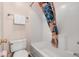 Clean bathroom featuring a combination shower and tub, toilet, and a decorative shower curtain at 453 Red River Ct. # 38 I, Myrtle Beach, SC 29579