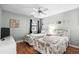 Comfortable guest bedroom featuring two twin beds, hardwood floors, and beach-themed decor at 453 Red River Ct. # 38 I, Myrtle Beach, SC 29579