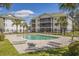 Community pool with lounge chairs and condo views at the River Oaks Golf and Tennis Resort at 453 Red River Ct. # 38 I, Myrtle Beach, SC 29579