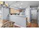 Kitchenette featuring light wood cabinets and a pass-through window to the dining area at 453 Red River Ct. # 38 I, Myrtle Beach, SC 29579