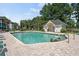 Community pool area featuring a bath house and lounge chairs for relaxing by the pool at 453 Red River Ct. # 38 I, Myrtle Beach, SC 29579