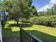 View of the lush, manicured lawn and garden of the home, creating a serene outdoor space at 5001 Little River Rd. # E-117-119, Myrtle Beach, SC 29577