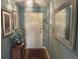 Entry way featuring a coat closet, with a decorative light and picture frames at 5001 Little River Rd. # E-117-119, Myrtle Beach, SC 29577