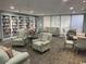 Inviting community library featuring a cozy sitting area and an extensive collection of books at 5001 Little River Rd. # E-117-119, Myrtle Beach, SC 29577