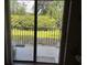 View from patio with mature manicured garden and greenery at 5001 Little River Rd. # E-117-119, Myrtle Beach, SC 29577