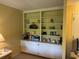 Built-in shelving provides ample storage space, complemented by stylish decor at 5001 Little River Rd. # E-117-119, Myrtle Beach, SC 29577