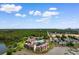 Aerial view of 501 Maison Dr, highlighting its proximity to lush green landscape and waterway at 501 Maison Dr. # F14, Myrtle Beach, SC 29572