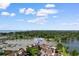 Aerial view of 501 Maison Dr, nestled amidst lush greenery, golf course, and a tranquil lake at 501 Maison Dr. # F14, Myrtle Beach, SC 29572