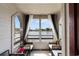 A covered balcony provides an ideal spot for enjoying serene water views and comfortable seating at 501 Maison Dr. # F14, Myrtle Beach, SC 29572