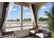 Relaxing balcony with comfortable seating overlooking a picturesque water view at 501 Maison Dr. # F14, Myrtle Beach, SC 29572