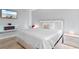 Modern bedroom with platform bed, fireplace and beach-themed television display at 501 Maison Dr. # F14, Myrtle Beach, SC 29572