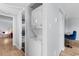 Laundry area featuring a stackable washer and dryer near the kitchen at 501 Maison Dr. # F14, Myrtle Beach, SC 29572