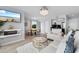 Open living area with a modern fireplace, dining space, and comfortable seating for relaxation and entertainment at 501 Maison Dr. # F14, Myrtle Beach, SC 29572