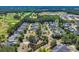 Panoramic aerial view of a residential community featuring a pool, ponds, and golf course nearby at 5038 Belleglen Ct. # 202, Myrtle Beach, SC 29579