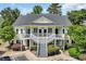 Charming two-story condo with double stairway access and well-maintained landscaping at 5038 Belleglen Ct. # 202, Myrtle Beach, SC 29579