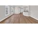 Bright, open-concept area with hardwood floors connecting to the kitchen at 5038 Belleglen Ct. # 202, Myrtle Beach, SC 29579
