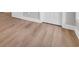 Living room featuring light hardwood flooring with white doorframes and trim at 5038 Belleglen Ct. # 202, Myrtle Beach, SC 29579