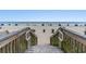 Stairway leading to a picturesque beach with calm ocean waters at 504 N Ocean Blvd. N # 309, Myrtle Beach, SC 29577