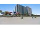 Beach access with palm trees and dunes near condominium complex at 504 N Ocean Blvd. N # 309, Myrtle Beach, SC 29577