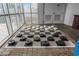 Indoor recreation area with chess or checkers with black and white pieces and pool toys in the background at 504 N Ocean Blvd. N # 309, Myrtle Beach, SC 29577