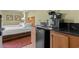 Small kitchenette area featuring coffee maker, microwave, sink and mini fridge at 504 N Ocean Blvd. N # 309, Myrtle Beach, SC 29577