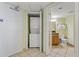 Small laundry closet and adjacent bathroom, perfect for a compact living space at 504 N Ocean Blvd. N # 309, Myrtle Beach, SC 29577