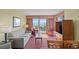 Cozy living room with ocean view, comfortable seating, and warm natural lighting at 504 N Ocean Blvd. N # 309, Myrtle Beach, SC 29577