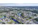 Scenic aerial view of a lakeside community with lush greenery and well-maintained homes at 523 Stonemason Dr., Myrtle Beach, SC 29579