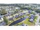 Aerial view of a well-planned community featuring ponds and tree-lined streets at 523 Stonemason Dr., Myrtle Beach, SC 29579
