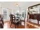 Bright dining area with hardwood floors, elegant chandelier, and decorative accents at 523 Stonemason Dr., Myrtle Beach, SC 29579