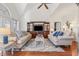 Inviting living room featuring vaulted ceilings, hardwood floors, and comfortable seating arrangements at 523 Stonemason Dr., Myrtle Beach, SC 29579