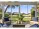 Relaxing sunroom with comfortable seating and a view of the water at 523 Stonemason Dr., Myrtle Beach, SC 29579