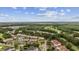 Aerial view of the community showcasing manicured landscaping, swimming pool, and nearby golf course at 5750 Oyster Catcher Dr. # 333, North Myrtle Beach, SC 29582